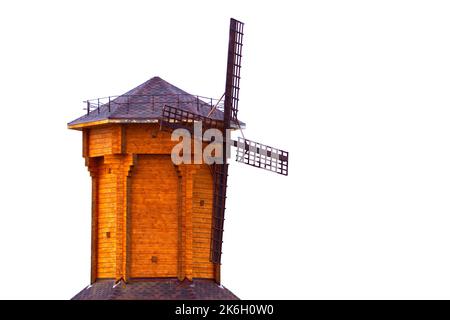 Modello in legno di un vecchio mulino a vento su sfondo bianco. Foto Stock