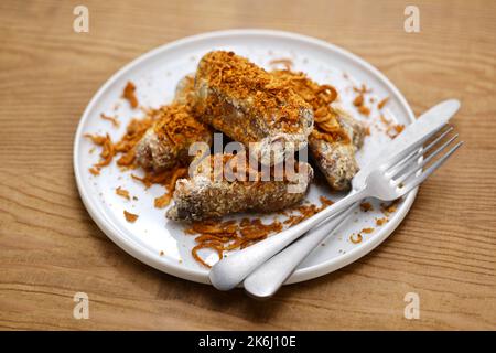 Costolette di maiale speziate in stile Hunan fatte in casa; costolette di maiale in cucina a vuoto a bassa temperatura e poi fritte, infine cospargere spezie in stile Hunan Foto Stock