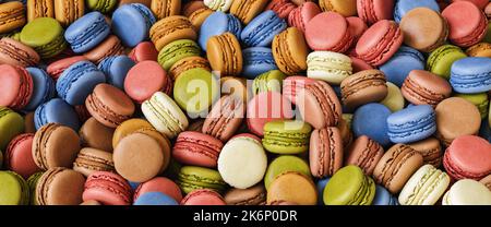 Macaron francesi colorati come sfondo Foto Stock