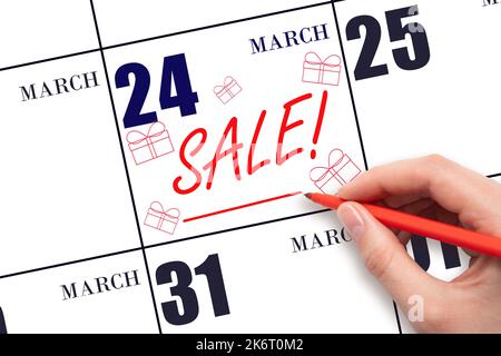 24th° giorno di marzo. Vendita di testo a mano e disegni di scatole regalo in data di calendario 24 marzo. Promemoria per gli acquisti. Shopping online. Mese di primavera, giorno di t Foto Stock