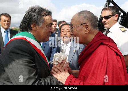 Palermo, arrival of the Dalai Lama in Palermo at Bocca di Falco airport. In the picture the Dalai Lama welcomed by the mayor of Palermo Leoluca Orlando. 17/09/2017, Palermo, Italy Stock Photo