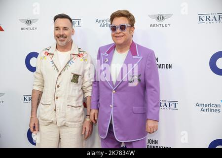 Elton John e David arredare frequentando il Elton John Aids Foundation Midsummer Party a Jean Pigozzi della Villa Dorane, Antibes, Francia. Foto Stock