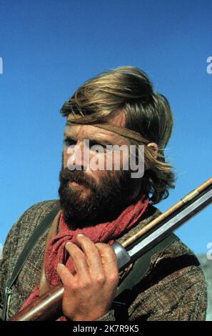 Robert Redford Film: Geremiah Johnson (1974) personaggi: Geremiah Johnson regista: Sydney Pollack 10 settembre 1972 **AVVERTENZA** questa fotografia è solo per uso editoriale ed è copyright di WARNER BROS e/o del fotografo assegnato dalla Film o dalla Production Company e può essere riprodotta solo da pubblicazioni in concomitanza con la promozione del film di cui sopra. È richiesto un credito obbligatorio a WARNER BROS. Il fotografo deve essere accreditato anche quando è noto. Nessun uso commerciale può essere concesso senza autorizzazione scritta da parte della Film Company. Foto Stock