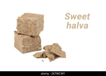 Halva di girasole su fondo bianco con l'iscrizione Sweet halva. Dolci orientali. Foto Stock