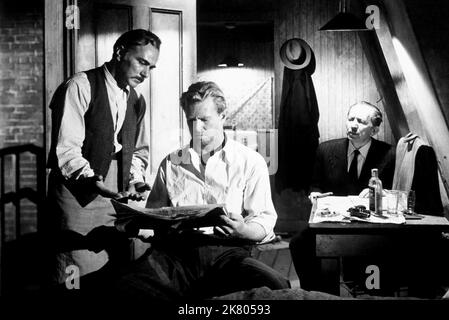Sterling Hayden Film The Asphalt Jungle (1950) personaggi: Dix Handley regista: John Huston 23 maggio 1950 **ATTENZIONE** questa fotografia è solo per uso editoriale ed è copyright della MGM e/o del fotografo assegnato dalla Film o Production Company e può essere riprodotta solo da pubblicazioni in concomitanza con la promozione del suddetto Film. È richiesto un credito obbligatorio a MGM. Il fotografo deve essere accreditato anche se conosciuto. Nessun uso commerciale può essere concesso senza l'autorizzazione scritta di The Film Company. Foto Stock