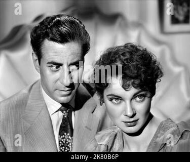 Ferdy Mayne & Marta Toren Film: L'uomo che ha guardato i treni passa per (1952) personaggi: Louis & Michele Rozier regista: Harold French 01 December 1952 **AVVERTENZA** questa fotografia è solo per uso editoriale ed è copyright dei FILM EROS e/o del fotografo assegnato dalla Film o dalla Production Company e può essere riprodotta solo da pubblicazioni in congiunzione con la promozione del film di cui sopra. È richiesto un credito obbligatorio per I FILM EROS. Il fotografo deve essere accreditato anche quando è noto. Nessun uso commerciale può essere concesso senza autorizzazione scritta da parte della Film Company. Foto Stock