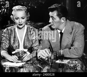 Olivia De Havilland & Robert Mitchum Film: Not as A Stranger (USA 1955) personaggi: Kristina Hedvigson, Lucas Marsh / Literaturverfilmung (basato sul libro di Morton Thompson) regista: Stanley Kramer 28 giugno 1955 **AVVERTENZA** questa fotografia è solo per uso editoriale ed è copyright di UNITED ARTISTS e/o del fotografo assegnato dalla Film o dalla Production Company e può essere riprodotta solo da pubblicazioni in concomitanza con la promozione del film di cui sopra. È richiesto un credito obbligatorio per GLI ARTISTI UNITI. Il fotografo deve essere accreditato anche quando è noto. Nessun uso commerciale può b Foto Stock