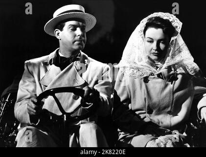 Fred MacMurray & Lynn Bari Film: Capitano Eddie (1940) personaggi: Capitano Edward Rickenbacker, Adelaide Frost Rickenbacker regista: Lloyd Bacon 19 giugno 1945 **AVVERTENZA** questa fotografia è solo per uso editoriale ed è copyright di 20th CENTURY FOX e/o del fotografo assegnato dalla Film o dalla Production Company e può essere riprodotta solo da pubblicazioni in concomitanza con la promozione del film di cui sopra. È richiesto un credito obbligatorio a 20th CENTURY FOX. Il fotografo deve essere accreditato anche quando è noto. Nessun uso commerciale può essere concesso senza l'autorizzazione scritta della Film com Foto Stock