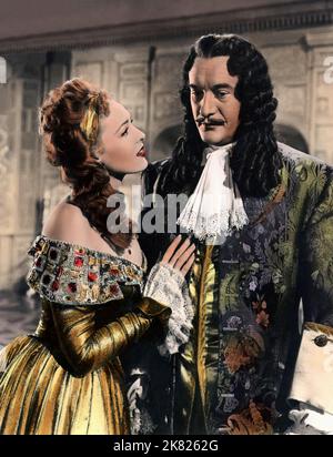 George Sanders & Linda Darnell Film: Per sempre Amber (1948) personaggi: Re Carlo II & Amber St. Clair regista: Otto Preminger 10 ottobre 1947 **AVVERTENZA** questa fotografia è solo per uso editoriale ed è copyright di 20 CENTURY FOX e/o del fotografo assegnato dalla Film o dalla Società di produzione e può essere riprodotta solo da pubblicazioni in concomitanza con la promozione del film di cui sopra. È richiesto un credito obbligatorio a 20 CENTURY FOX. Il fotografo deve essere accreditato anche quando è noto. Nessun uso commerciale può essere concesso senza autorizzazione scritta da parte della Film Company. Foto Stock