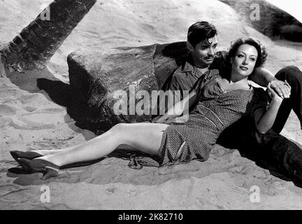 Clark Gable & Joan Crawford Film Strange Cargo (1941) personaggi: Andre Verne & Julie regista: Frank Borzage 01 marzo 1940 **ATTENZIONE** questa fotografia è solo per uso editoriale ed è copyright della MGM e/o del fotografo assegnato dalla Film o Production Company e può essere riprodotta solo da pubblicazioni in concomitanza con la promozione del suddetto Film. È richiesto un credito obbligatorio a MGM. Il fotografo deve essere accreditato anche se conosciuto. Nessun uso commerciale può essere concesso senza l'autorizzazione scritta di The Film Company. Foto Stock