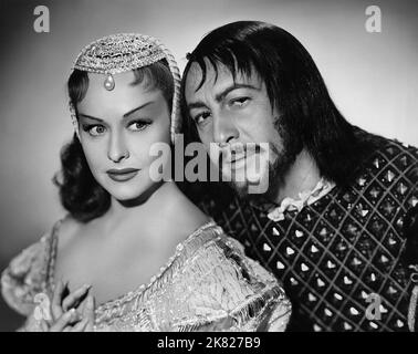 Paulette Goddard & Macdonald Carey Film: Sposa di Vengeance; Una maschera per Lucrezia (1949) personaggi: Lucrezia Borgia & Cesare Borgia 07 aprile 1949 **AVVERTENZA** questa fotografia è esclusivamente per uso editoriale ed è copyright di PARAMOUNT e/o del fotografo assegnato dalla Società di produzione e può essere riprodotta solo da pubblicazioni in concomitanza con la promozione del film sopra citato. È richiesto un credito obbligatorio a PARAMOUNT. Il fotografo deve essere accreditato anche quando è noto. Nessun uso commerciale può essere concesso senza autorizzazione scritta da parte della Film Company. Foto Stock