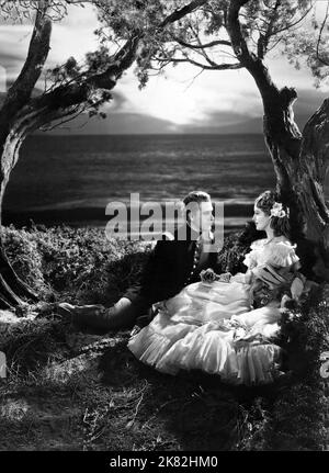 Nelson Eddy & Jeanette Macdonald Film: La ragazza del Golden West (1939) personaggi: Ramirez & Mary Robbins regista: Robert Z. Leonard 08 marzo 1938 **AVVERTENZA** questa fotografia è solo per uso editoriale ed è copyright di MGM e/o del fotografo assegnato dalla Film o dalla Production Company e può essere riprodotta solo da pubblicazioni in concomitanza con la promozione del film di cui sopra. È richiesto un credito obbligatorio a MGM. Il fotografo deve essere accreditato anche quando è noto. Nessun uso commerciale può essere concesso senza autorizzazione scritta da parte della Film Company. Foto Stock