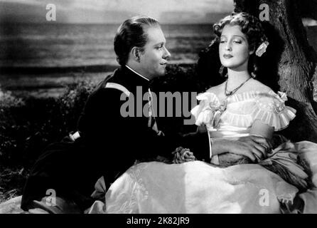 Nelson Eddy & Jeanette Macdonald Film: La ragazza del Golden West (1938) personaggi: Ramirez & Mary Robbins regista: Robert Z. Leonard 08 marzo 1938 **AVVERTENZA** questa fotografia è solo per uso editoriale ed è copyright di MGM e/o del fotografo assegnato dalla Film o dalla Production Company e può essere riprodotta solo da pubblicazioni in concomitanza con la promozione del film di cui sopra. È richiesto un credito obbligatorio a MGM. Il fotografo deve essere accreditato anche quando è noto. Nessun uso commerciale può essere concesso senza autorizzazione scritta da parte della Film Company. Foto Stock