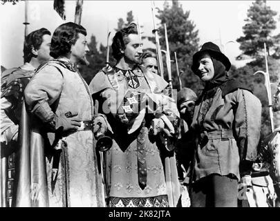 Claude Rains, Basil Rathbone & Errol Flynn Film: The Adventures of Robin Hood (USA 1938) personaggi: Prince John, Sir Guy of Gisbourne & Robin Hood regista: Michael Curtiz, W Keighley 14 maggio 1938 **AVVERTENZA** questa fotografia è solo per uso editoriale ed è copyright di WARNER BROS. E/o del fotografo assegnato dalla Film o dalla Production Company e può essere riprodotta solo da pubblicazioni in concomitanza con la promozione del film di cui sopra. È richiesto un credito obbligatorio a WARNER BROS.. Il fotografo deve essere accreditato anche quando è noto. Nessun uso commerciale può essere concesso senza scrittura Foto Stock