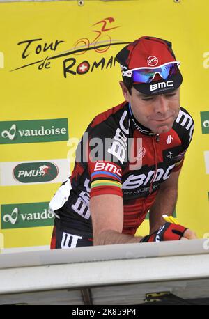 Tappa 3 del Tour di Romandy, Svizzera, Cadel Evans del Team BMC esce dal podio di partenza dopo aver firmato la 3rd tappa della gara a la Neuveville. Foto Stock