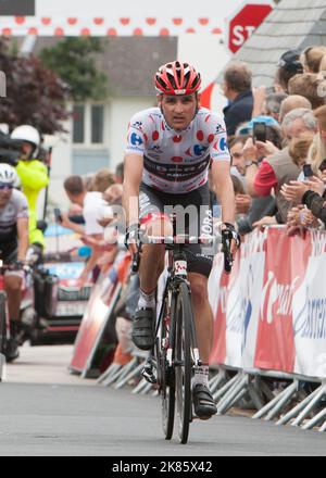 Paul Voss (Bora-Argon 18) si alloggia nella maglia pois della polka dopo aver condotto la pausa per la maggior parte della giornata Foto Stock