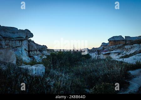 Foto scattata nel Paint Mines Interpretive Park nelle pianure orientali del Colorado (vicino a Calhan) - questa zona è formata da venti e contiene meraviglie naturali. Foto Stock