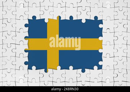 Bandiera svedese in cornice di pezzi di puzzle bianchi con parti centrali mancanti Foto Stock