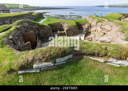 Skara Brae, insediamento neolitico costruito in pietra, situato sulla baia di Skaill , Neolitico, Mainland, Orcadi, Scozia, REGNO UNITO Foto Stock