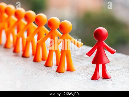 Rappresentazione di un team di lavoro e di un leader attraverso bambole Foto Stock