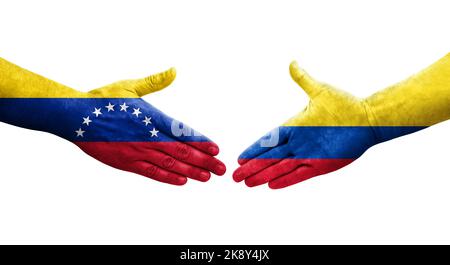 Stretta di mano tra Colombia e Venezuela bandiere dipinte sulle mani, immagine trasparente isolata. Foto Stock