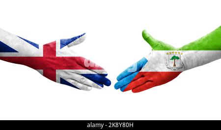 Stretta di mano tra la Guinea Equatoriale e la Gran Bretagna bandiere dipinte a mano, immagine trasparente isolata. Foto Stock