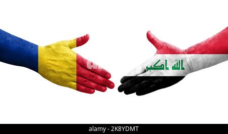 Stretta di mano tra Iraq e Romania bandiere dipinte a mano, immagine trasparente isolata. Foto Stock