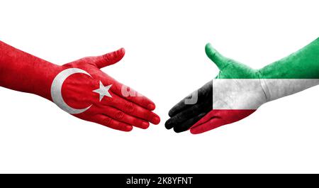 Stretta di mano tra Kuwait e Turchia bandiere dipinte sulle mani, immagine trasparente isolata. Foto Stock