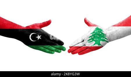 Stretta di mano tra Libano e Libia bandiere dipinte sulle mani, immagine trasparente isolata. Foto Stock