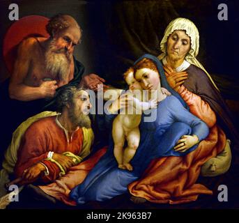 Santa Famiglia con San Girolamo, Lorenzo Lotto, (Venezia 1480 - Loreto 1556) , Firenze, Italia. ( Sant'Anna, appoggiata al gradino su un letto a baldacchino, con le gambe aperte, con la Vergine e il Bambino Gesù, tra loro, San Girolamo, a sinistra, indicando con la mano aperta la Sacra Famiglia, ) Foto Stock