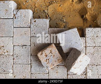 pavimentazione pavimentazione pavimentazione pavimentazione pavimentazione mattoni pietra posa mattoni, lavori marciapiedi Foto Stock