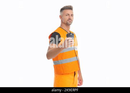 uomo appaltatore positivo in uniforme arancione. uomo appaltatore che indossa giubbotto riflettente di lavoro. Foto Stock