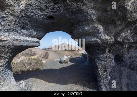 Paesaggio roccioso intorno al vulcano Montana de Guenia, Città stratificata, Lanzarote, Isole Canarie, Spagna Foto Stock