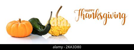 Tre zucche isolate su sfondo panoramico bianco. Banner Web buon giorno del Ringraziamento Foto Stock