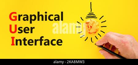 Simbolo dell'interfaccia grafica utente. Interfaccia grafica utente di Concept Words su un bellissimo sfondo giallo. Lampadina. Grafica aziendale e GUI Foto Stock