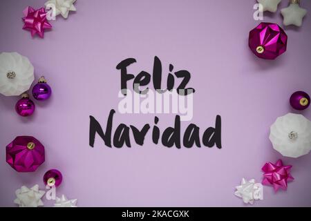 Viola Natale sfondo, Feliz Navidad significa buon Natale, piatto laico Foto Stock