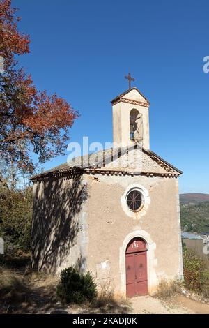 La Chapelle Saint-Croix vicino al villaggio di Saint-Cirq-Lapopie in autunno, Lot Dipartimento, Francia Foto Stock