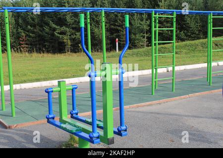 Simulatore di sport all'aperto in un campo di allenamento. Il concetto di uno stile di vita sano Foto Stock