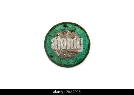 British Pound Coin Going Green da ossidazione Foto Stock