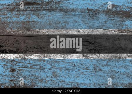 Bandiera del Botswana dipinta su un vecchio sfondo di legno danneggiato Foto Stock