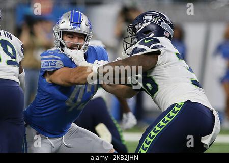 Il fullback Nick Bellore (43) di Detroit Lions si precipita contro il fullback tre Madden (38) di Seattle Seahawks durante la prima metà di una partita di football NFL contro i Seattle Seahawks a Detroit, Michigan USA, domenica 28 ottobre 2018. (Foto di Amy Lemus/NurPhoto) Foto Stock