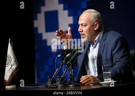 Rappresentante del movimento islamico della Jihad della Palestina in Iran Nasser Abu Sharif parla durante il Seminario globale delle unioni di Pro-Moqawama e degli autori e editori della resistenza a Teheran-Iran il 14 novembre 2018. (Foto di Rouzbeh Fouladi/NurPhoto) Foto Stock