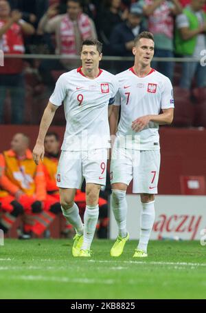 Robert Lewandowski (POL),Arkadiusz Milik (POL) durante la partita DI QUALIFICAZIONE DELL'EURO tra Polonia e FYR Macedonia allo Stadion Narodowy il 13 ottobre 2019 a Varsavia Polonia. (Foto di Foto Olimpik/NurPhoto) Foto Stock