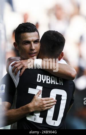 Juventus Forward Cristiano Ronaldo (7) festeggia con la Juventus Forward Paulo Dybala (10) dopo aver segnato il suo gol per renderlo 2-0 durante la Serie A Football Match n.6 JUVENTUS - SPAL il 28 settembre 2019 allo Stadio Allianz di Torino, Piemonte, Italia. Risultato finale: Juventus-Spal 2-0. (Foto di Matteo Bottanelli/NurPhoto) Foto Stock