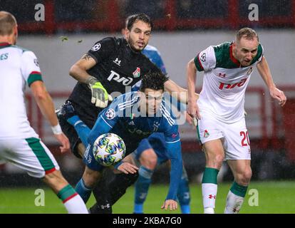 Cristiano Ronaldo di Juventus (L) e Guilherme di FC Lokomotiv Moskva vie per la palla durante la partita di UEFA Champions League D tra FC Lokomotiv Moskva e Juventus alla RZD Arena il 06 novembre 2019 a Mosca, Russia. (Foto di Igor Russak/NurPhoto) Foto Stock
