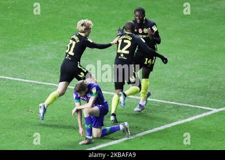 Kamohelo Mokotjo di Brentford festeggia dopo aver segnato il secondo gol del gioco durante la partita del campionato Sky Bet tra Wigan Athletic e Brentford al DW Stadium di Wigan sabato 9th novembre 2019. (Foto di Tim Markland/MI News/NurPhoto) Foto Stock