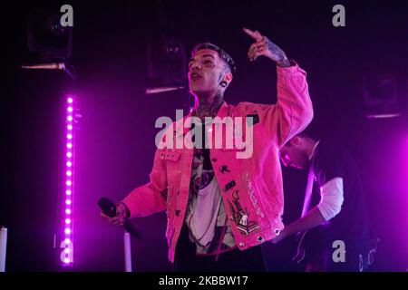 Gionnyscandal suona dal vivo ad Alcatraz il 28 novembre 2019 a Milano. Gionnyscandal è un rapper italiano, nel 2009 arrivano le prime composizioni e inizia ad interessarsi a YouTube con i video delle sue prime registrazioni. Nel 2010 ha ottenuto una media di 100.000 visualizzazioni per ogni video caricato, così ha iniziato a fare un nome per se stesso nella scena rap italiana. (Foto di Mairo Cinquetti/NurPhoto) Foto Stock