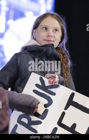 L'attivista svedese sul clima Greta Thunberg parla alla marcia sul clima durante la Conferenza ONU sul clima del COP25 2019. I dimostranti vogliono chiedere ai politici responsabili di dimostrare maggiore impegno nella lotta contro il riscaldamento globale (Foto di Oscar Gonzalez/NurPhoto) Foto Stock