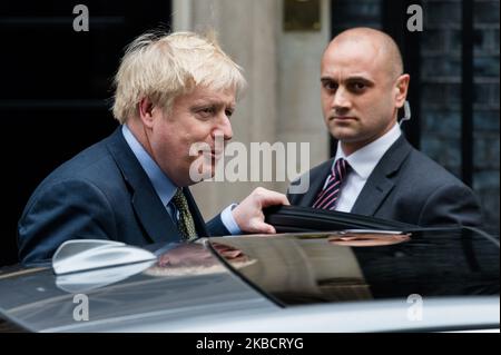 Il primo ministro britannico Boris Johnson lascia 10 Downing Street per Buckingham Palace per chiedere il permesso della regina di formare un nuovo governo il 13 dicembre 2019 a Londra, Inghilterra. Il Partito conservatore sotto la guida di Boris Johnson ha raggiunto una maggioranza Pariamentaria nelle elezioni generali di ieri. (Foto di Wiktor Szymanowicz/NurPhoto) Foto Stock