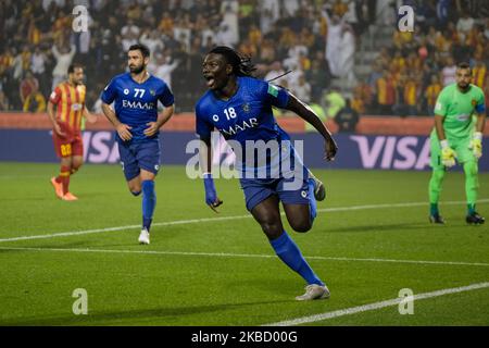 Bafétimbi Gomis celebrates after scoring in the FIFA Club World Club Cup quarter final between Espérance de Tunis and Al Hilal at the Jassim bin Hamad Stadium in Doha, Qatar on December 14 2019. (Photo by Simon Holmes/NurPhoto) Stock Photo